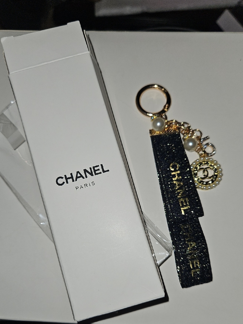 CHANEL Black and Gold Pearl Charm Keyring